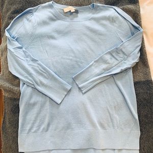 Pale blue sweater with shoulder detail